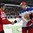 MINSK, BELARUS - MAY 9: Russia's Anton Belov #77 and Switzerland's Reto Suri #24 shake hands following preliminary round action at the 2014 IIHF Ice Hockey World Championship. (Photo by Andre Ringuette/HHOF-IIHF Images)

